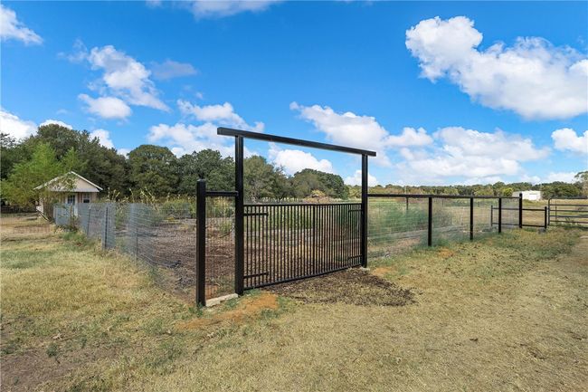 Entrance to organic garden beds. | Image 32