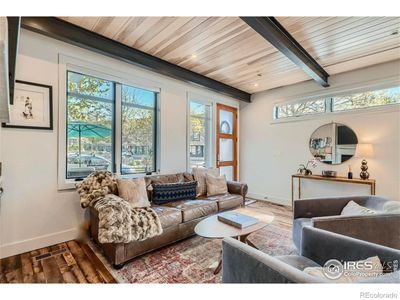 Living Room. Reclaimed oak floors, custom steel fabrication, steel beams, lots of light | Image 3