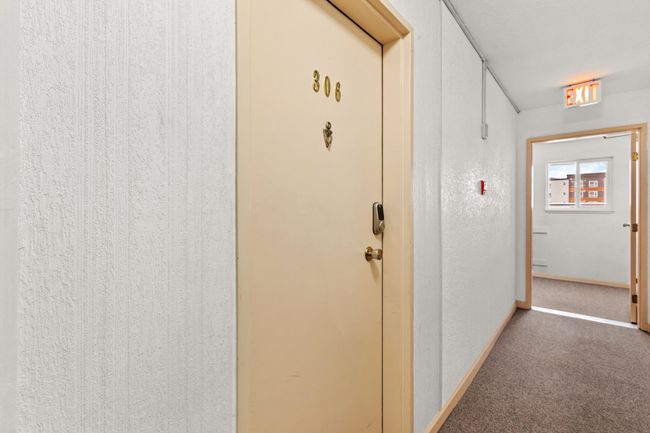 Corridor with baseboards and carpet flooring | Image 22