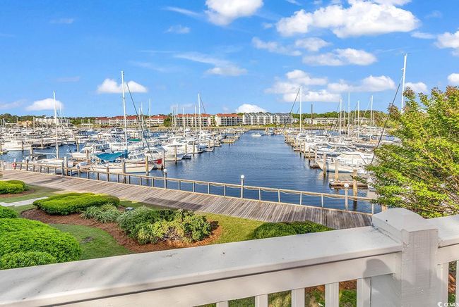 Water view with a dock | Image 29