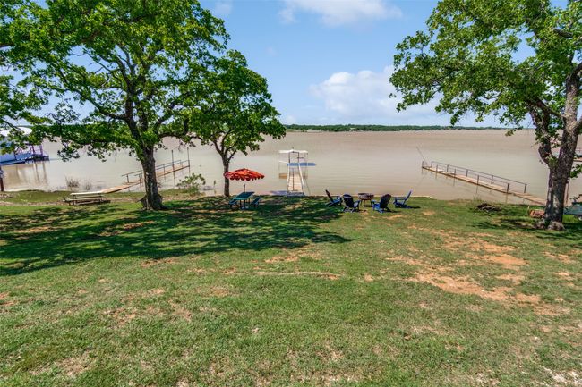 Spacious green space! *Please note, there was a severe storm prior to photos being taken so lake appears brown. It's normal state is shown in previous photos. | Image 37