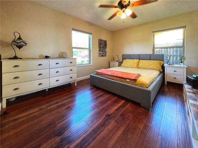LARGE MASTER BEDROOM WITH WOOD FLOORS | Image 13