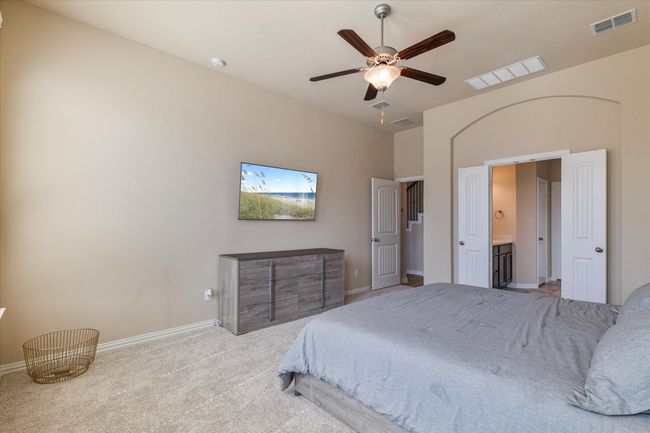 Bedroom featuring baseboards, carpet, and a ceiling fan | Image 16