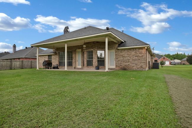 Back of house with a patio, brick siding, and roof with shingles | Image 30