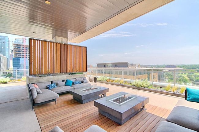 Deck featuring an outdoor living space with a fire pit | Image 27
