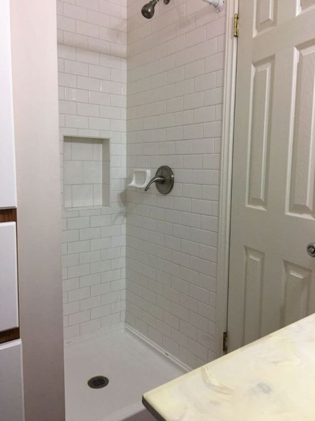 Full bathroom featuring a shower stall | Image 8