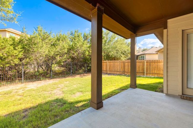 Fenced backyard featuring a patio | Image 25