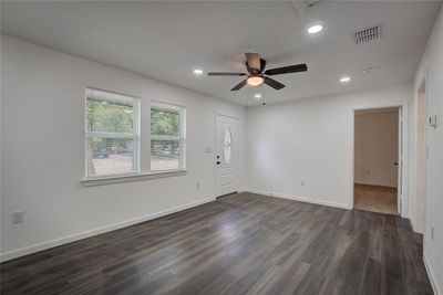 Living room with ceiling fan | Image 3