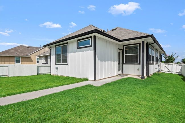 Back of house featuring board and batten siding | Image 15