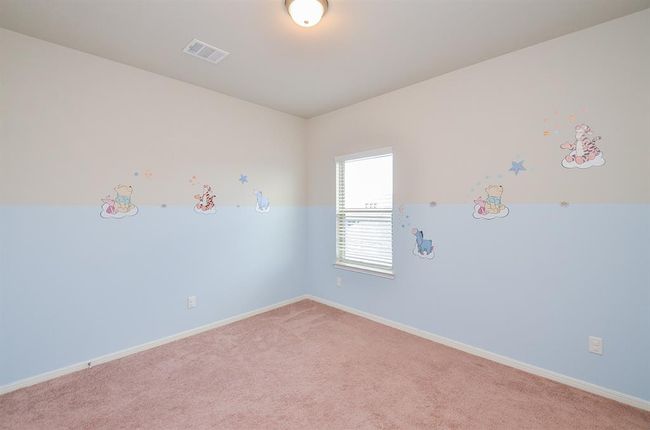 This secondary bedroom would be fine as a nursery, don't you think? | Image 22