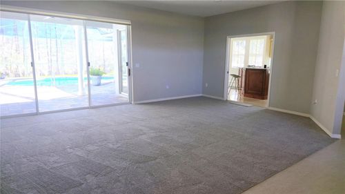 1003 Berkshire Ln, TARPON SPRINGS, FL, 34688-7627 | Card Image