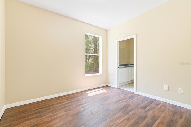 11933 Pasco Trails Blvd, House other with 4 bedrooms, 3 bathrooms and null parking in SPRING HILL FL | Image 25