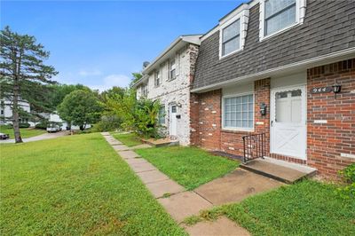 View of side of home featuring a lawn | Image 2