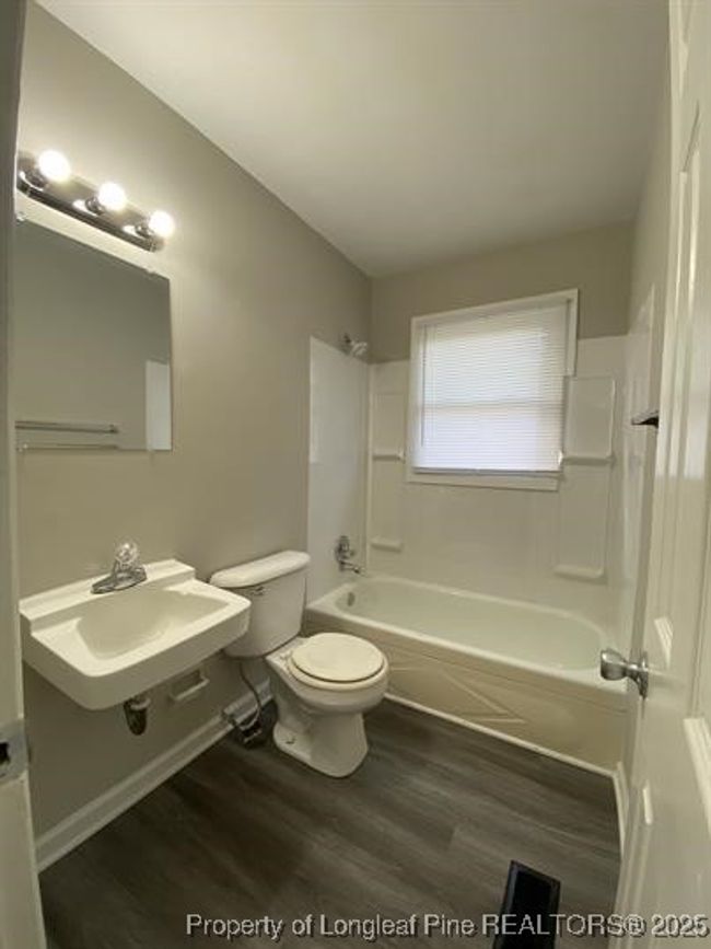B - 703 Lake Ave, Condo with 2 bedrooms, 1 bathrooms and null parking in Spring Lake NC | Image 14