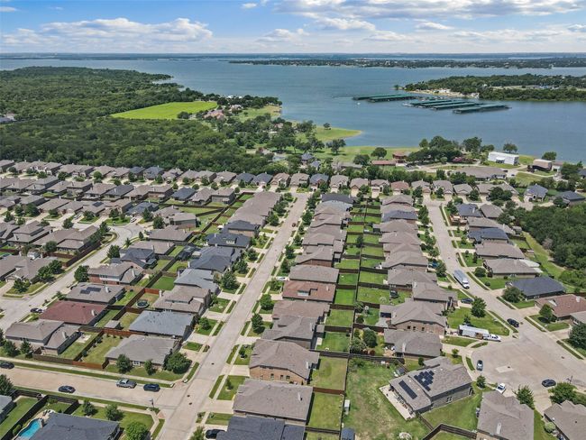 View of Lake from home, easy walk to the water, greenbelts and community pools. | Image 21