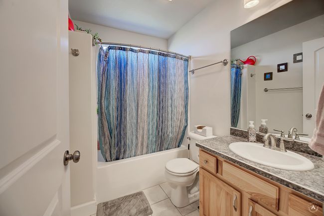 Guest Bathroom is flanked by two bedrooms | Image 31
