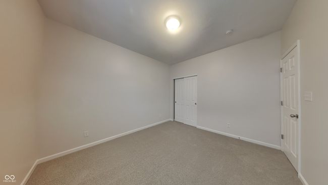 carpeted spare room featuring baseboards | Image 11