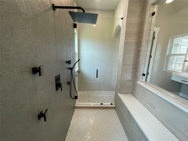 Bathroom featuring a shower stall and tile patterned floors | Image 23