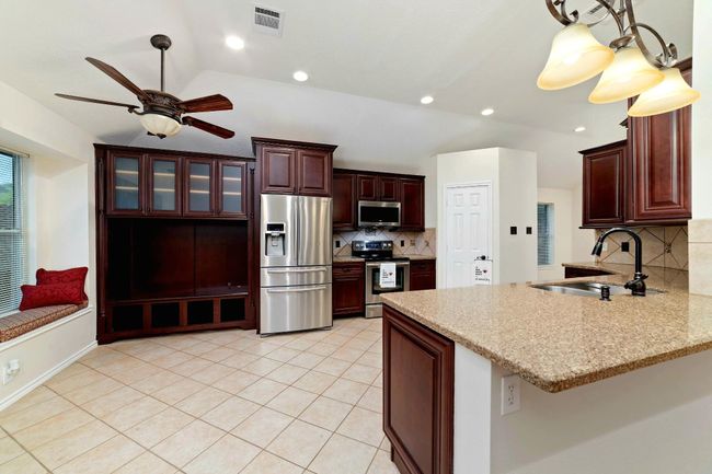 Upgraded kitchen cabinetry showcases meticulous craftsmanship and elevated design—where every detail serves both beauty and function. | Image 15