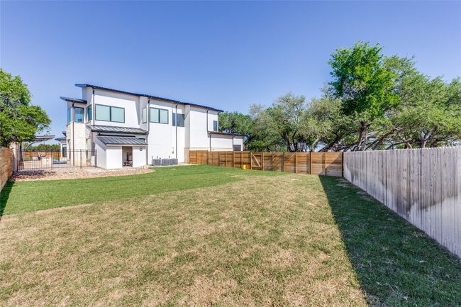 View of yard with a fenced backyard | Image 36
