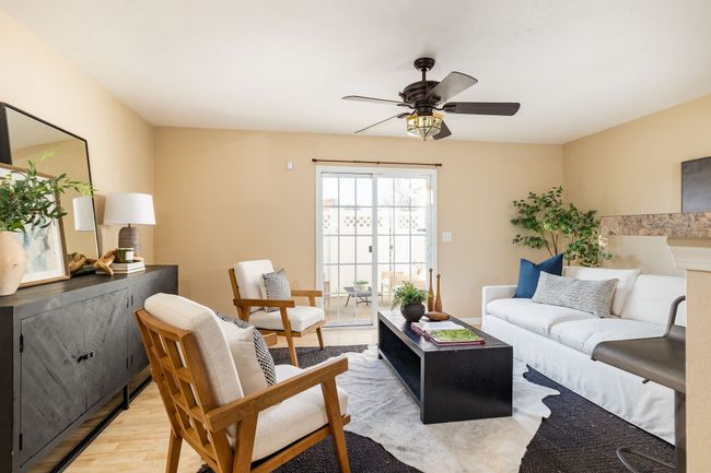 Expansive family room open to the kitchen and also a private back patio | Image 10