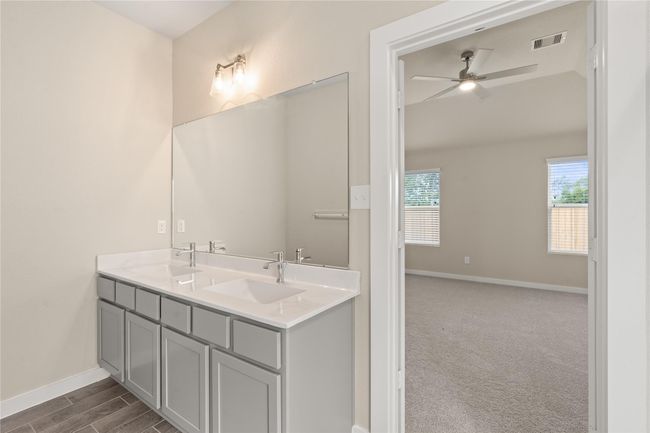 This photo is for illustrative purposes only and is not to be considered an exact replica of the finished home. Rendering does not match the finished product in terms of features, colors, landscaping, etc. Pricing, specifications, square footage and materials are subject to change at any time and without notice. | Image 11