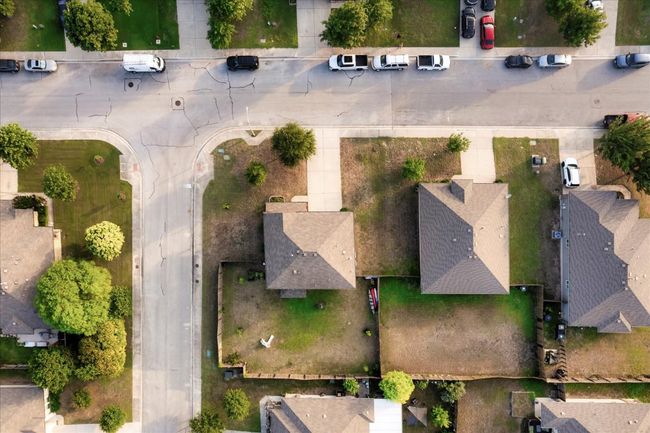 Aerial view of property and surrounding area with nearby suburban area | Image 35
