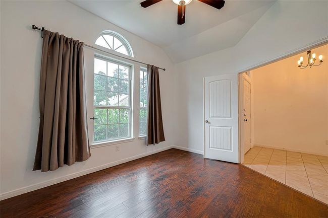 Gleaming engineered wood floors double wood doors for full privacy | Image 30