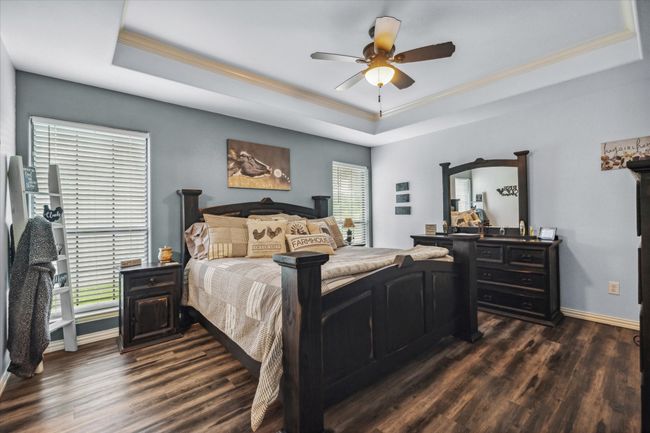 Master suite is large with tray ceilings | Image 17