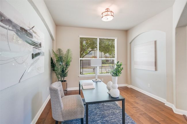 Home office with wood finished floors and baseboards | Image 20