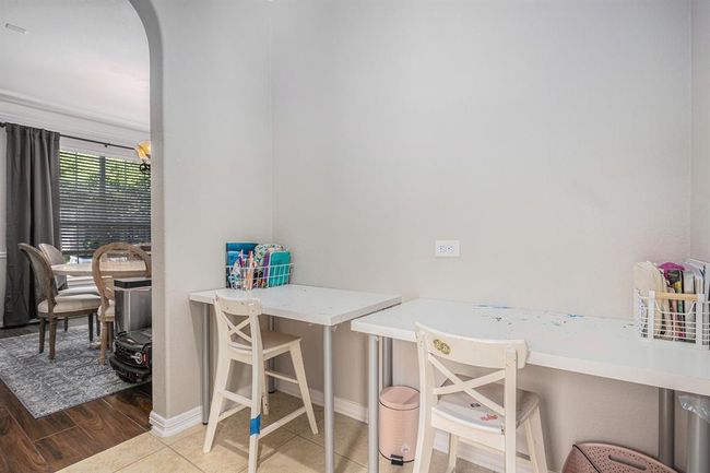 Butler's pantry area that is being utilized as a study space | Image 19