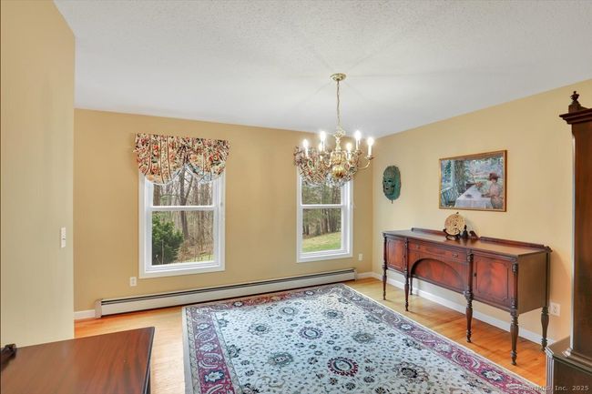 Large formal dining room with hardwood floors | Image 10