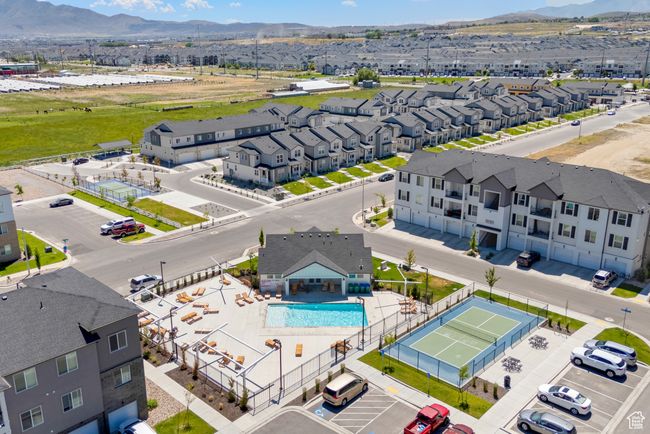 Aerial view of a pool area and a mountainous background | Image 18