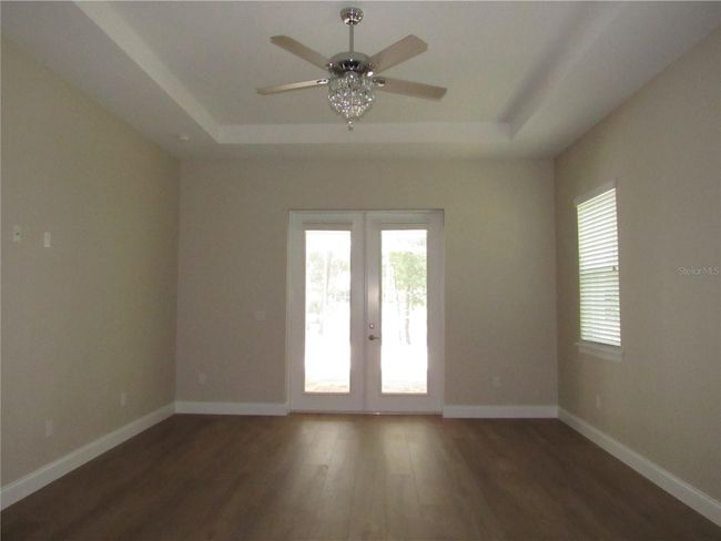 primary bedroom with pool access | Image 28