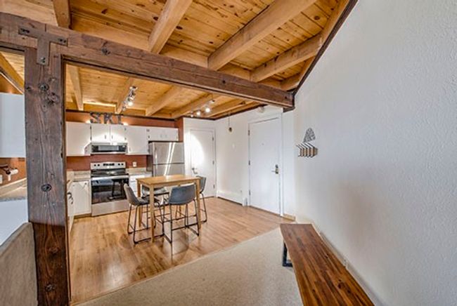 Dining space with wood ceiling, beamed ceiling, and light wood-style floors | Image 4