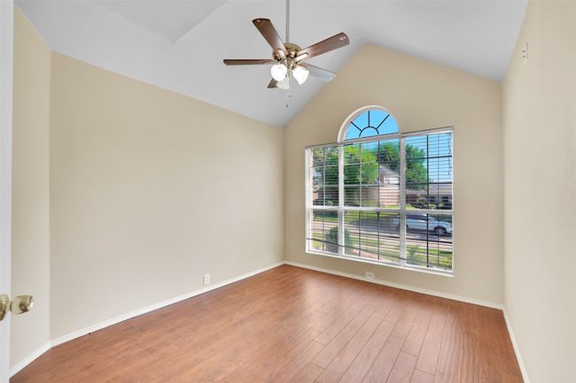bedroom 2 with ceiling fan, hardwood / wood-style flooring, and plenty of natural light | Image 16