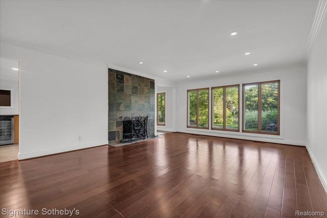 Family Room with Wood-Burning Fireplace | Image 8