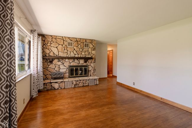 Living Room w/ hardwoods & fireplace | Image 5