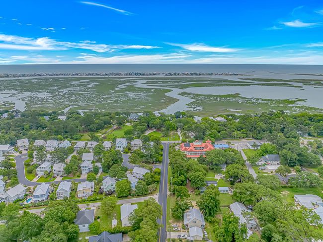 Aerial view of property and surrounding area featuring a large body of water and nearby suburban area | Image 39