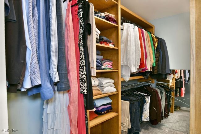 View of spacious closet | Image 32