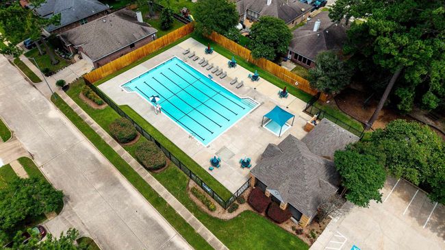 Summer rays sparkling over the community pool — a welcoming space for everyone to enjoy! | Image 43