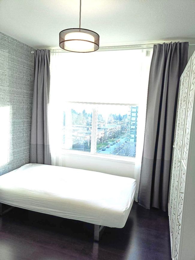 Bedroom featuring dark wood finished floors | Image 6