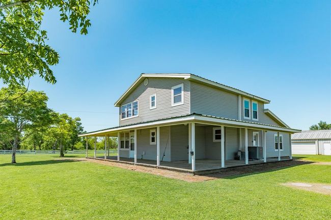Gotta love a wrap-around porch. | Image 9