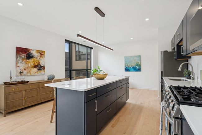 With smart, spacious storage built right into the island, everything you need stays organized and within reach. | Image 9