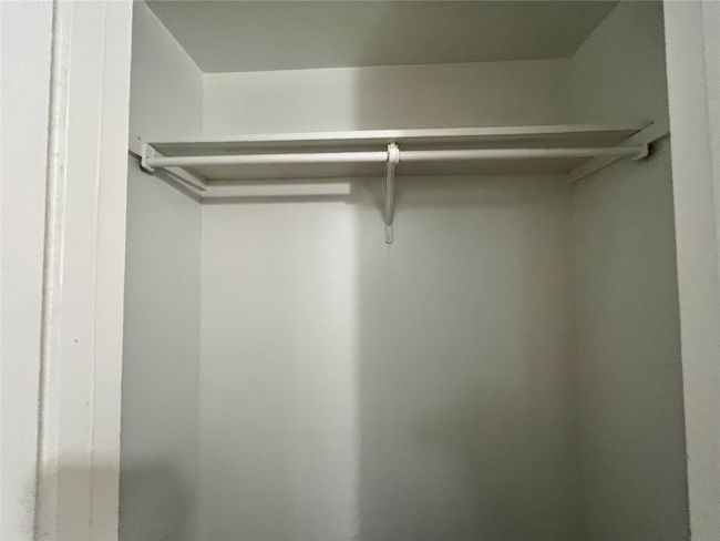 Here is another double closet. | Image 13