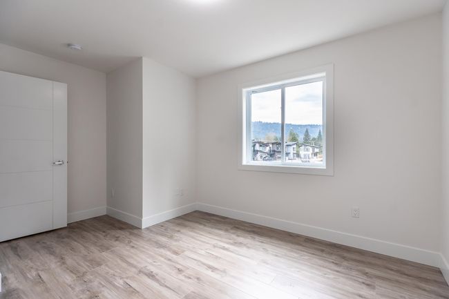 Empty room featuring baseboards and light wood-style floors | Image 19