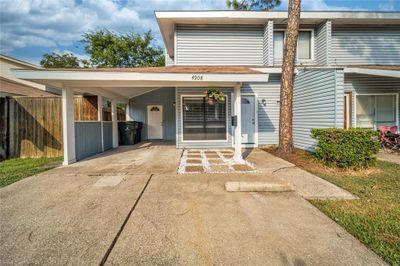 Front view of house featuring a carport | Image 1