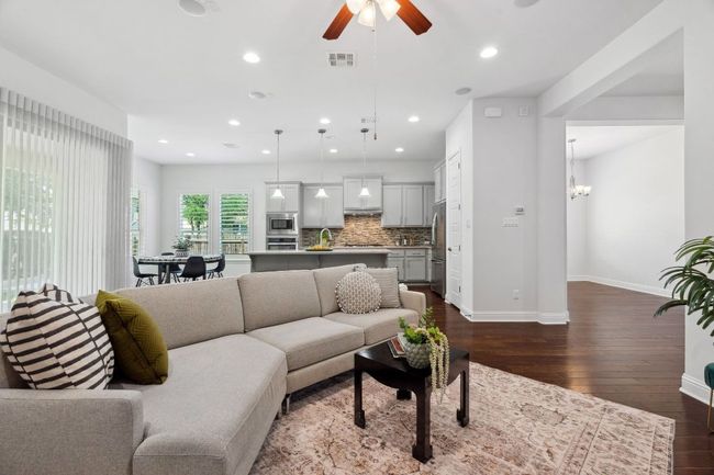 The entire home features ambient lighting with abundant natural light and recessed lighting. | Image 9