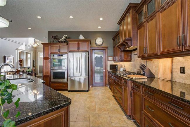 22 Tuscany Estates Crescent Nw, Home with 3 bedrooms, 2 bathrooms and 4 parking in Calgary AB | Image 13