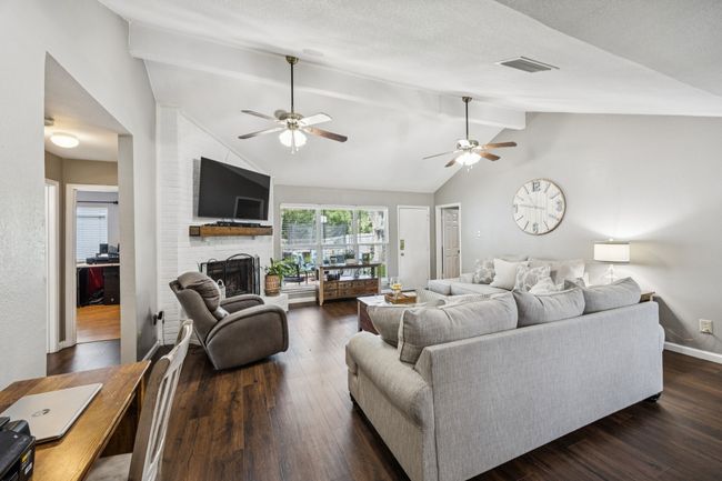 You can see the wall of windows with the beautiful view of the backyard. | Image 6